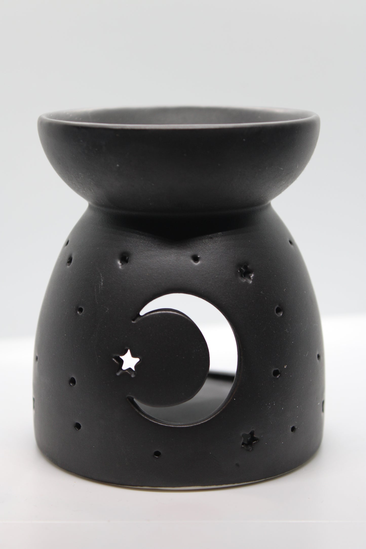 Crescent moon cut out burner